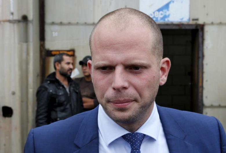 Belgium's Asylum and Migration State Secretary Francken visits a military barrack used as an accommodation centre for refugees in Namur