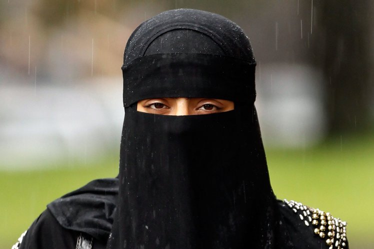 Muslim Women Wearing The Controversial Niqab In The UK