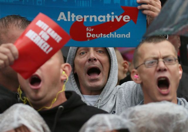 2017-09-06T221238Z_1438655023_RC1753DE1190_RTRMADP_3_GERMANY-ELECTION-MERKEL